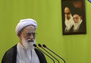 Iranian senior cleric Ayatollah Mohammad Emami Kashani delivers his sermon during Friday prayers at the Tehran university campus, in Tehran, Iran, Friday, Sept. 25, 2015. Thousands of Iranian worshippers have marched in Tehran after Friday prayers to denounce the "incompetency" of Saudi Arabia in handling the annual hajj pilgrimage. The protest came a day after at least 719 pilgrims died during a crush on the outskirts of the holy city of Mecca. (AP Photo/Vahid Salemi)