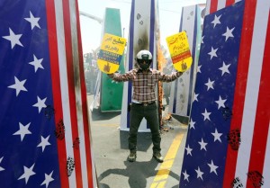 Iranians Protest the US, KSA and Israel (Photo Credit: AFP) 