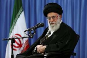 In this picture released by an official website of the office of the Iranian supreme leader, Supreme Leader Ayatollah Ali Khamenei attends a meeting with a group of religious performers in Tehran, Iran, Thursday, April 9, 2015. Iran's top leader on Thursday stopped short of giving his endorsement to the framework nuclear deal struck last week between Teheran and world powers, while the country's president warned separately that Tehran's approval of a final deal depends on the immediate lifting of all sanctions related to its controversial nuclear program. (AP Photo/Office of the Iranian Supreme Leader)
